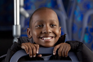 happy kid on bus