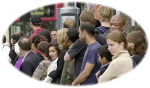 crowd waiting for bus