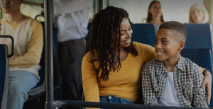 Mother with her son on public transportation