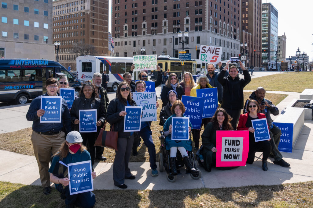 TRU members with "I Support Public Transit" signs at the State Capitol.