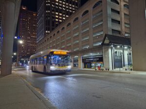 Old DDOT bus in downtown Detroit at night