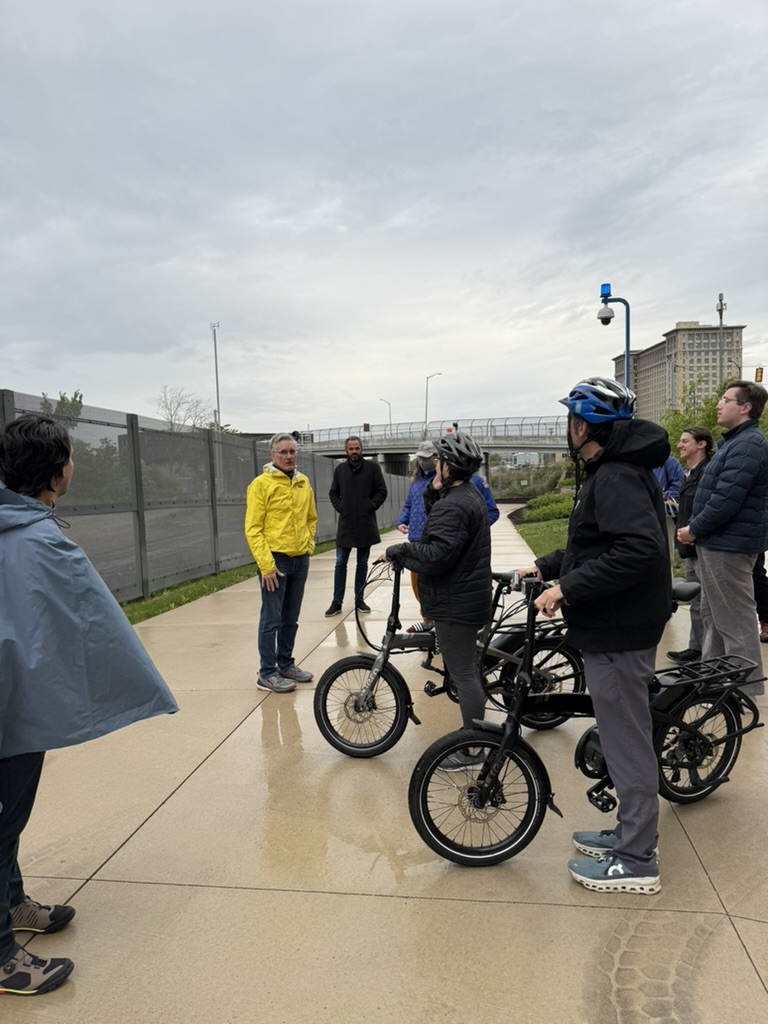 Todd Scott surrounded by a group, speaking about the Southwest