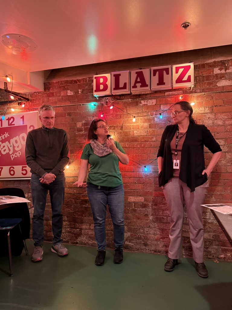 From left to right: Todd Scott, Megan Owens, and Christina Peltier speaking