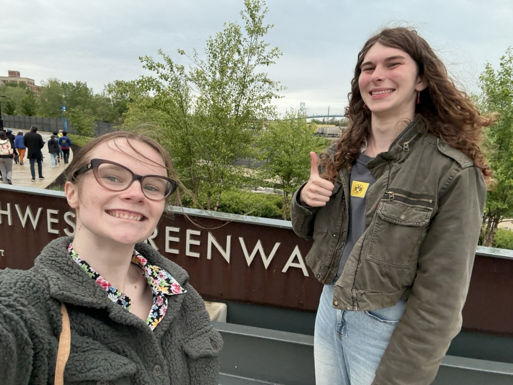 Petra and Theresa with the Southwest Greenway sign