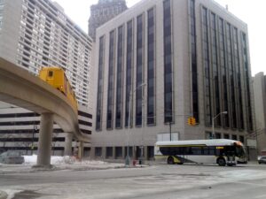 Old DDOT bus and People Mover in the Winter
