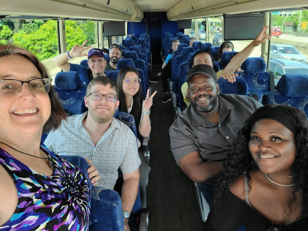 Happy people on the D2A2 bus headed to the Transit Tuesday Talk.