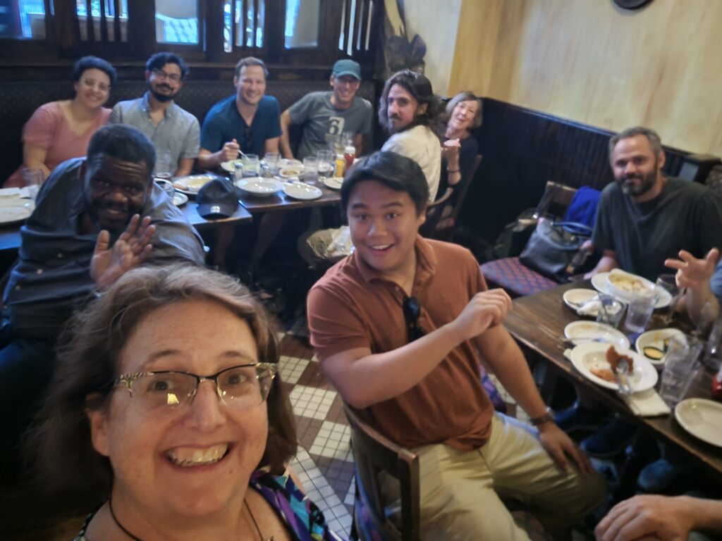 Happy people enjoying the Transit On Tap event at the pub.