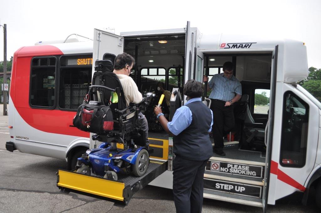 Person boarding SMART paratransit