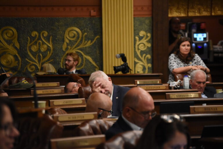 Republican legislators spend the early hours of Friday morning on the House floor for votes on the fiscal year 2027 budget. July 3, 2026. | Photo by Katherine Dailey/Michigan Advance.