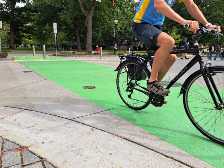 A biker in a bike lane in Ann Arbor