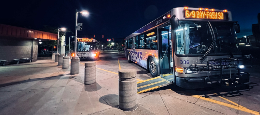 STARS buses in Saginaw at their downtown transfer station, at night